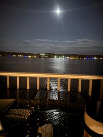 Moonlight over lake from screened in balcony