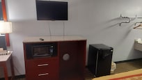 Flat screen TV, microwave, mini fridge. Fridge super clean, microwave pretty clean just a little splatter food on the inside top, not much at all. Room #116 (ground floor)