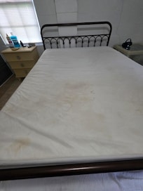 Bed cover that was underneath all of the sheets