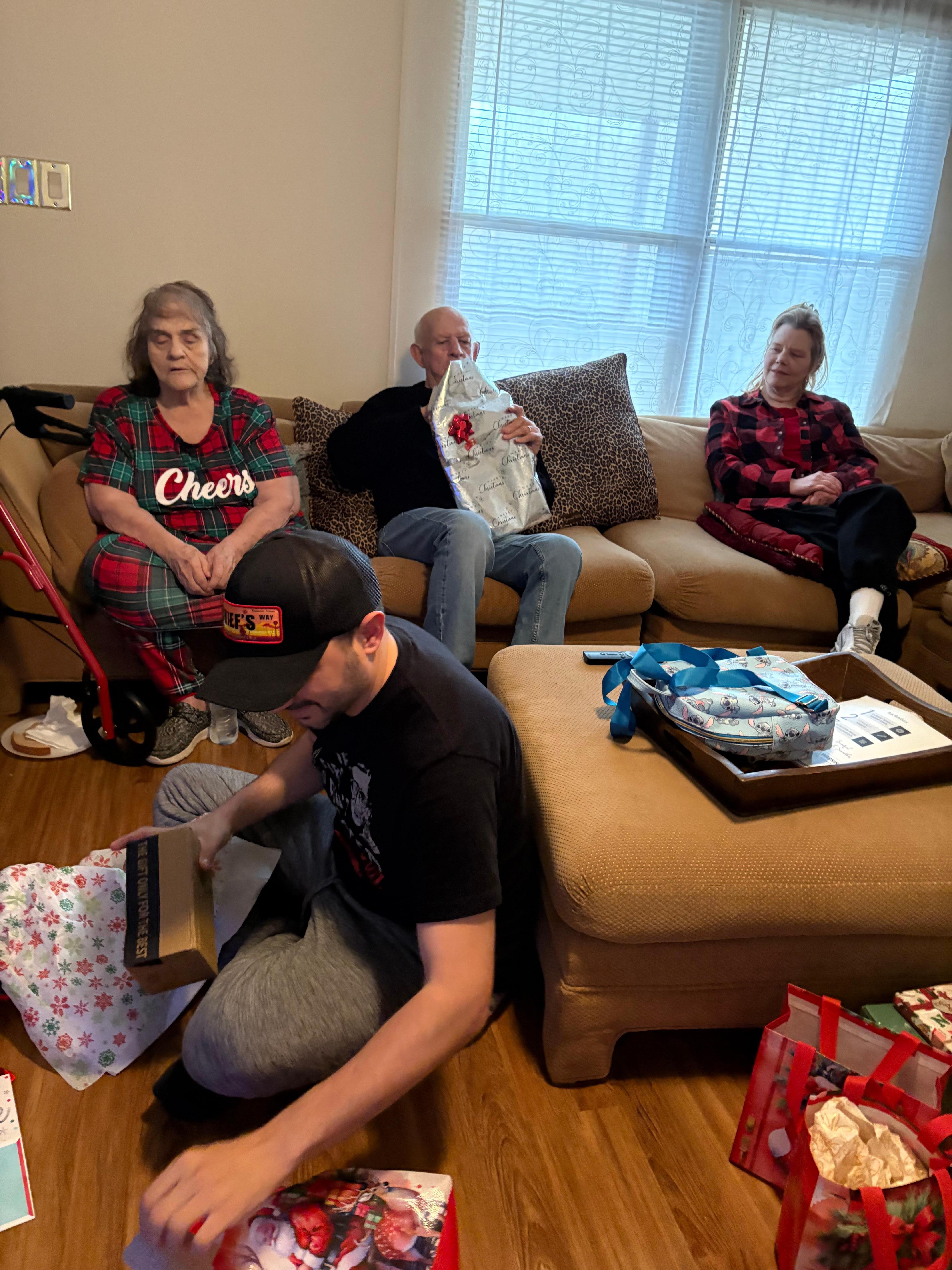 Opening presents Christmas Eve, after fireworks.