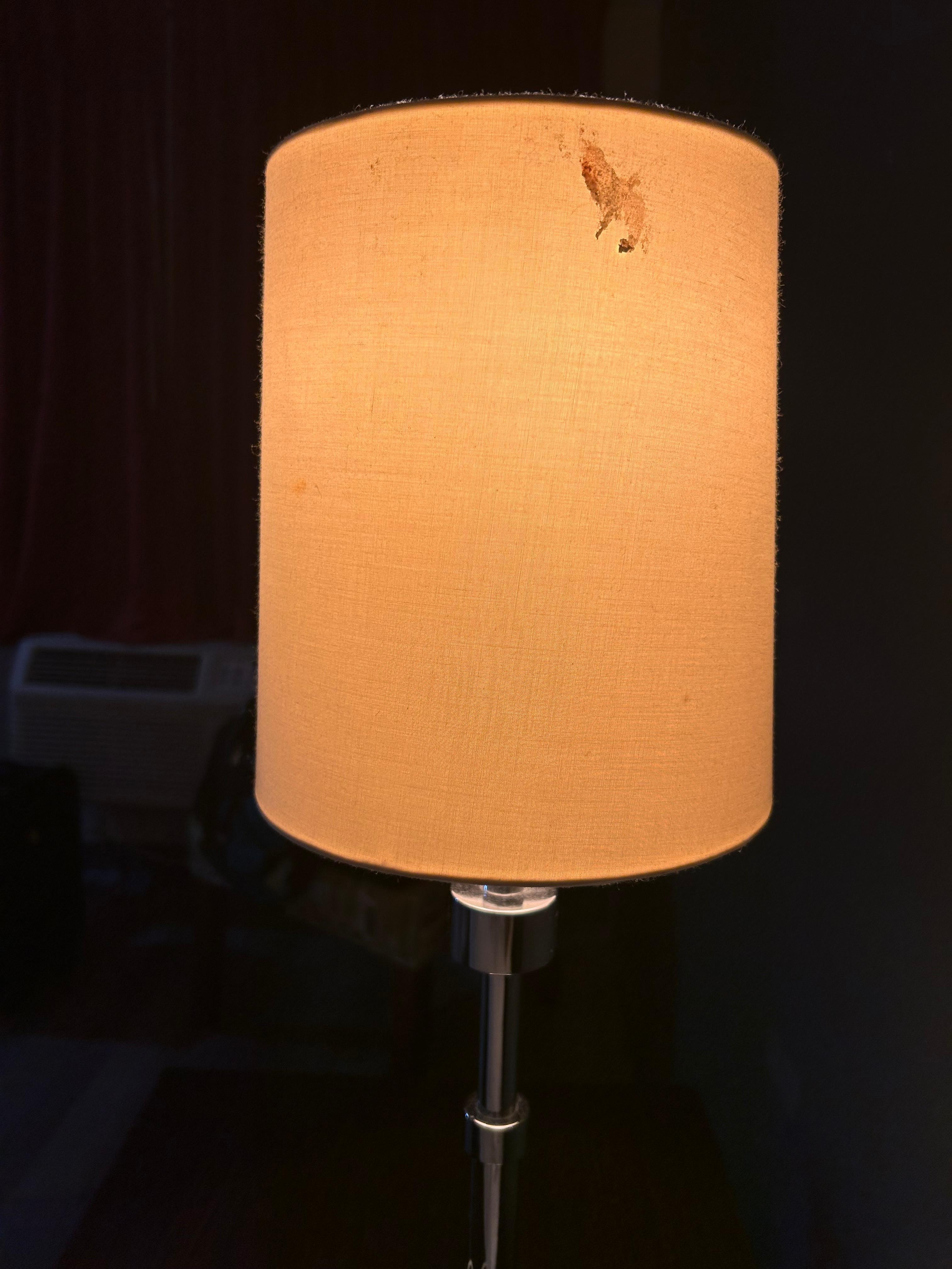 Appears to have blood on the lampshade
