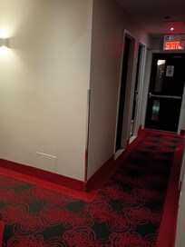 Well lite hallway with security caneras