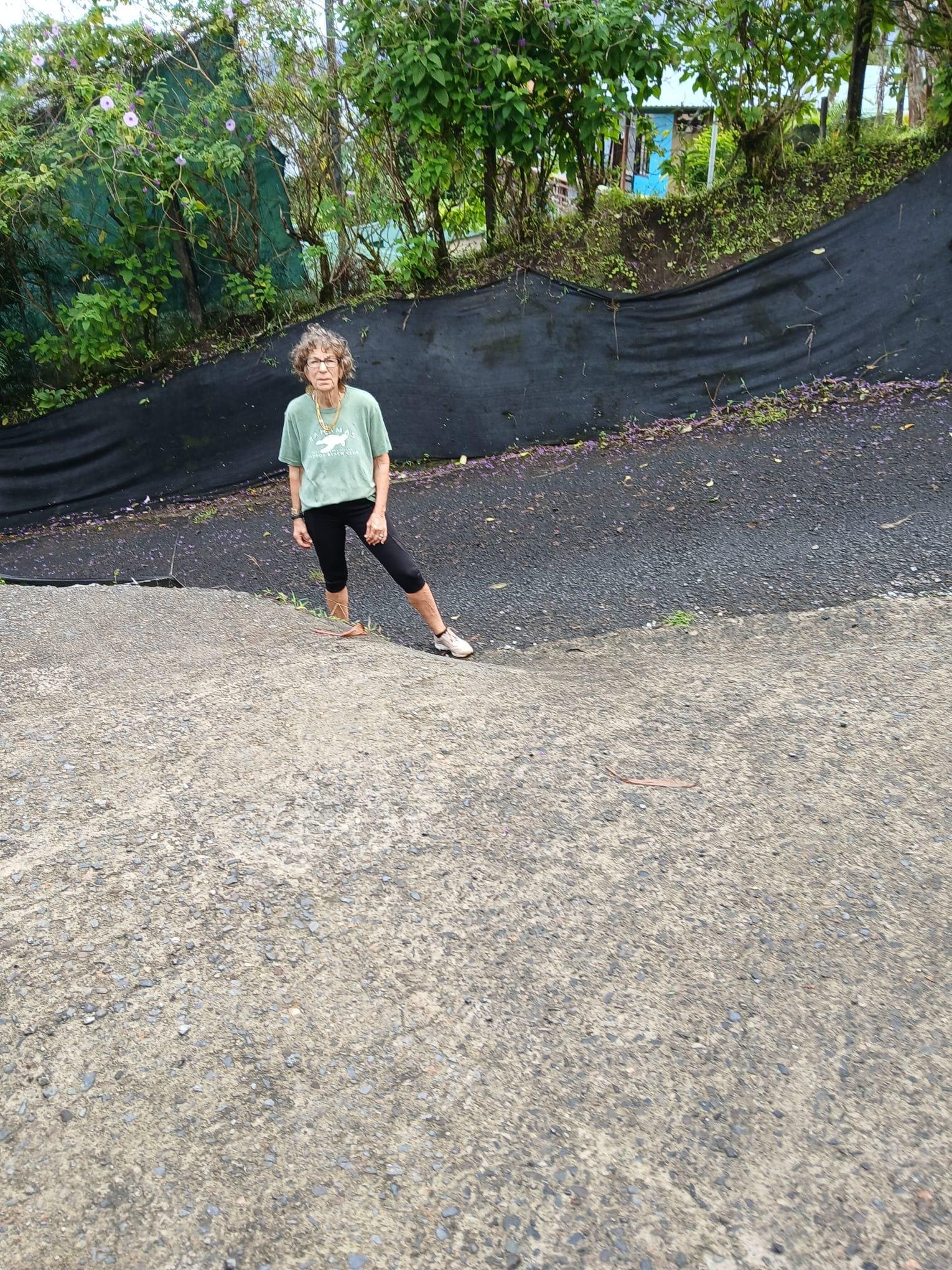 If you backup toward the passenger side, the car will go over a 2-3 foot drop off