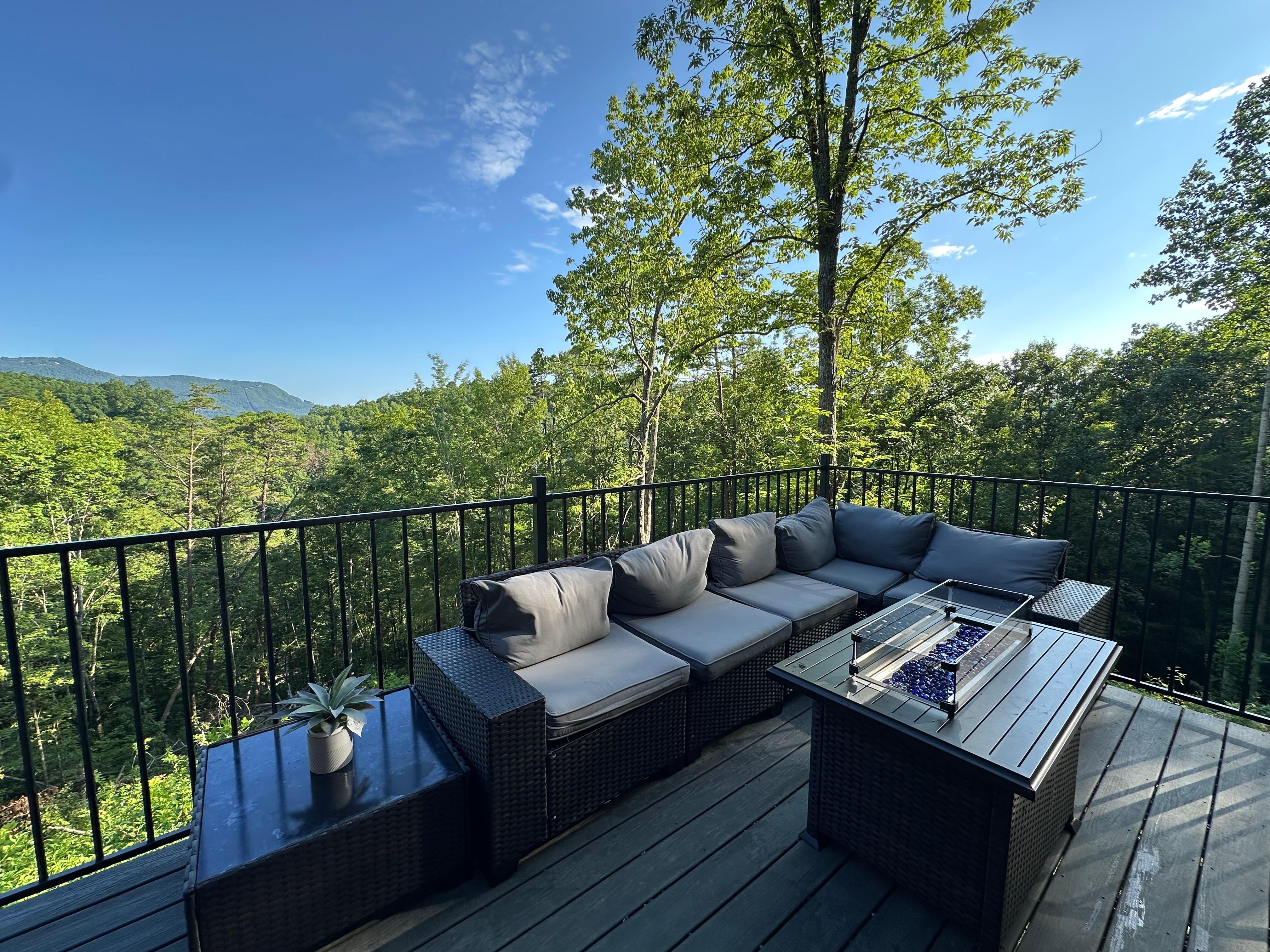 Outdoor conversational seating near the jetted hot tub/swim. 