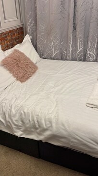 Dirty unwashed sheets and broken bed