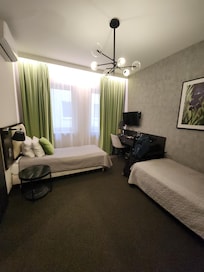 the twin room on 1st floor. It is ok.  Small. Not super clean. I moved because of the noisy party.