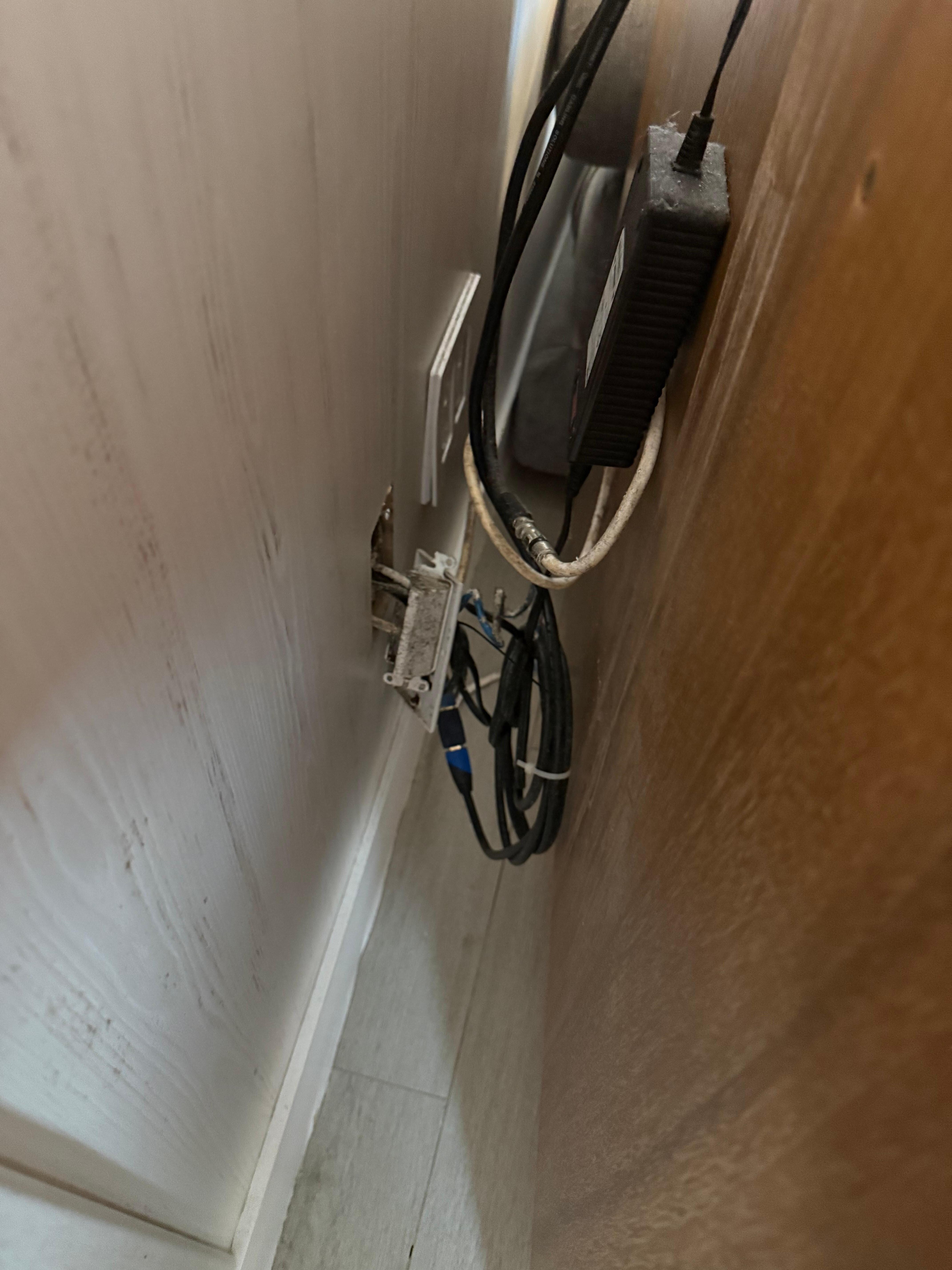 Plug hanging out of the wall