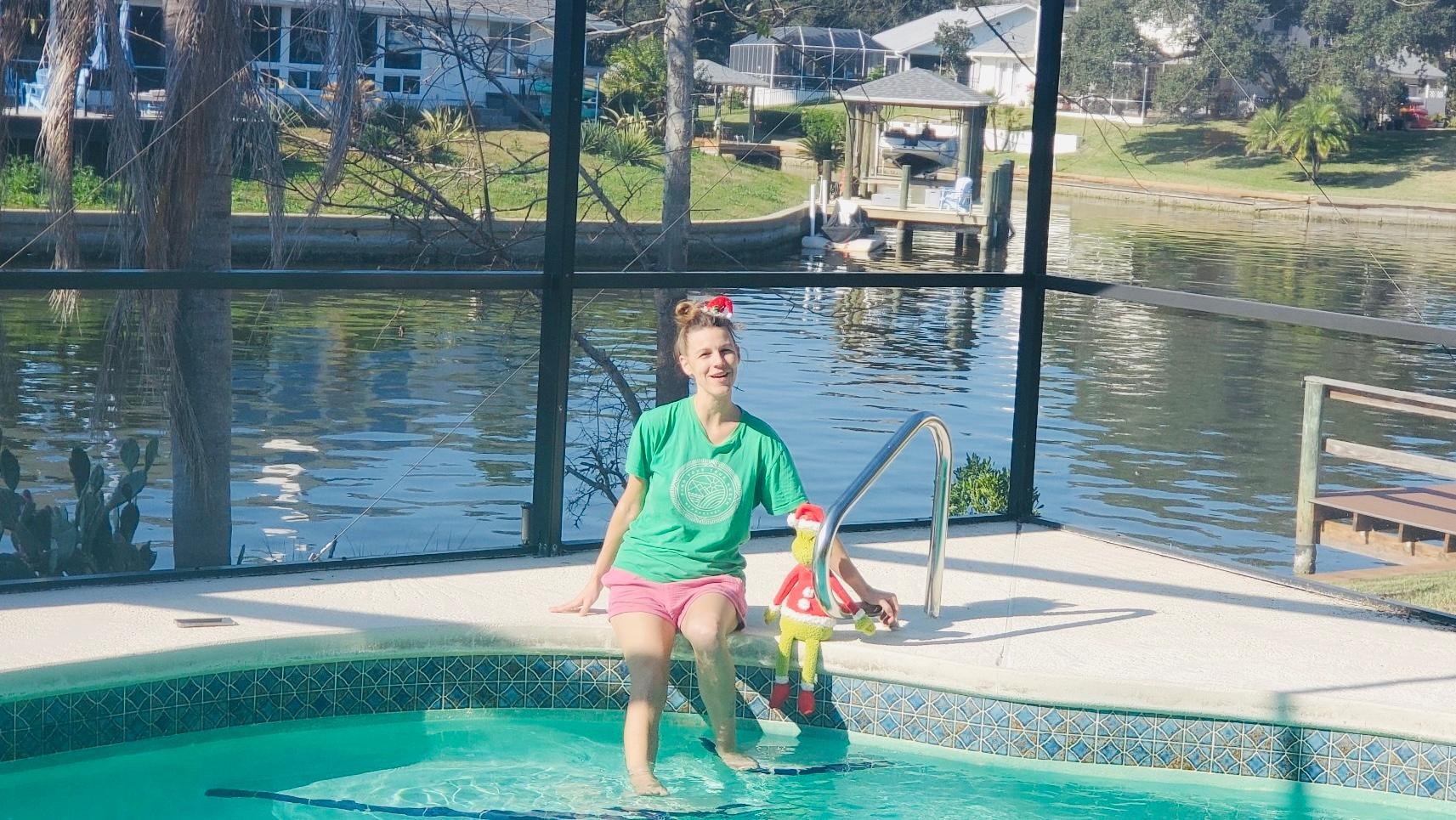 Relaxing by heated pool. A comfort 86 degrees 