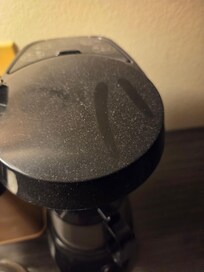 Dirty coffee pot. Beds falling apart, garbage under the bed