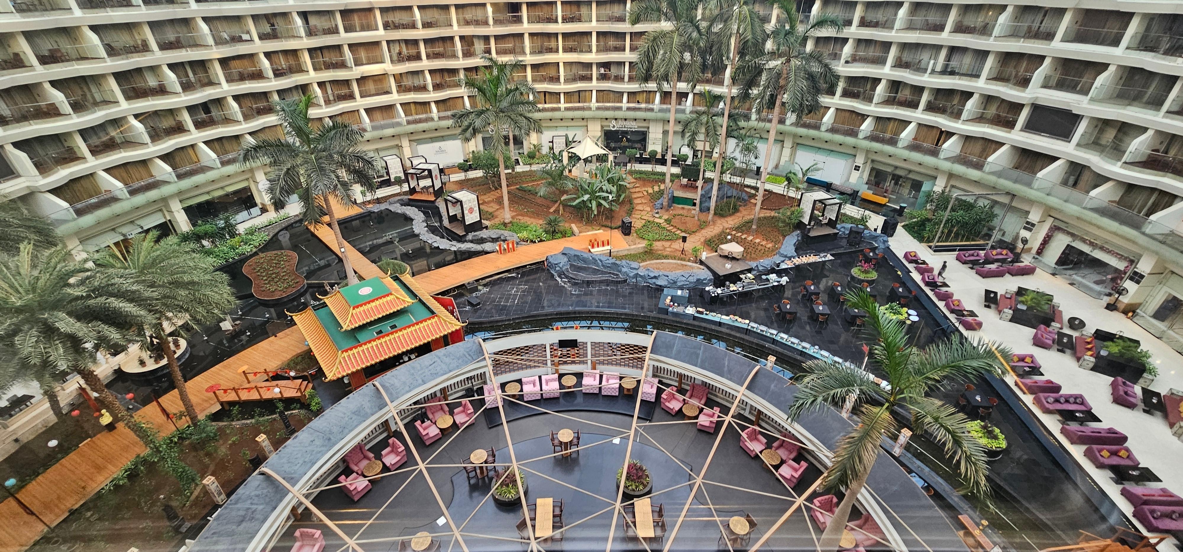 Cool atrium but mosquito fumigation sessions throughout the day