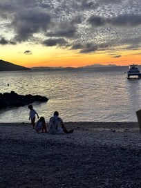 Afternoon drinks at Lovers cove - the kids from other families all played together on the beach