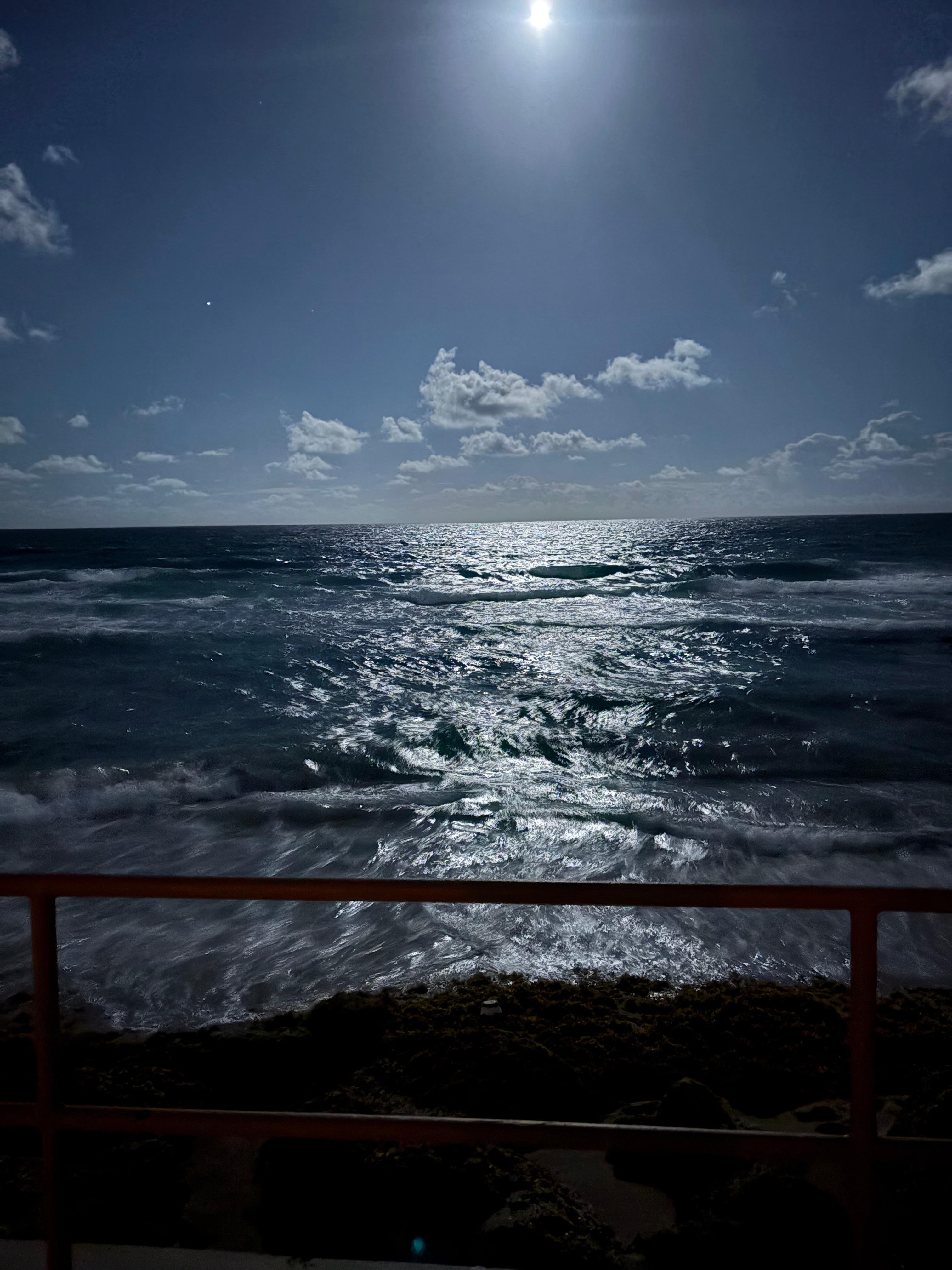 a moon lit ocean view