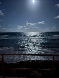a moon lit ocean view
