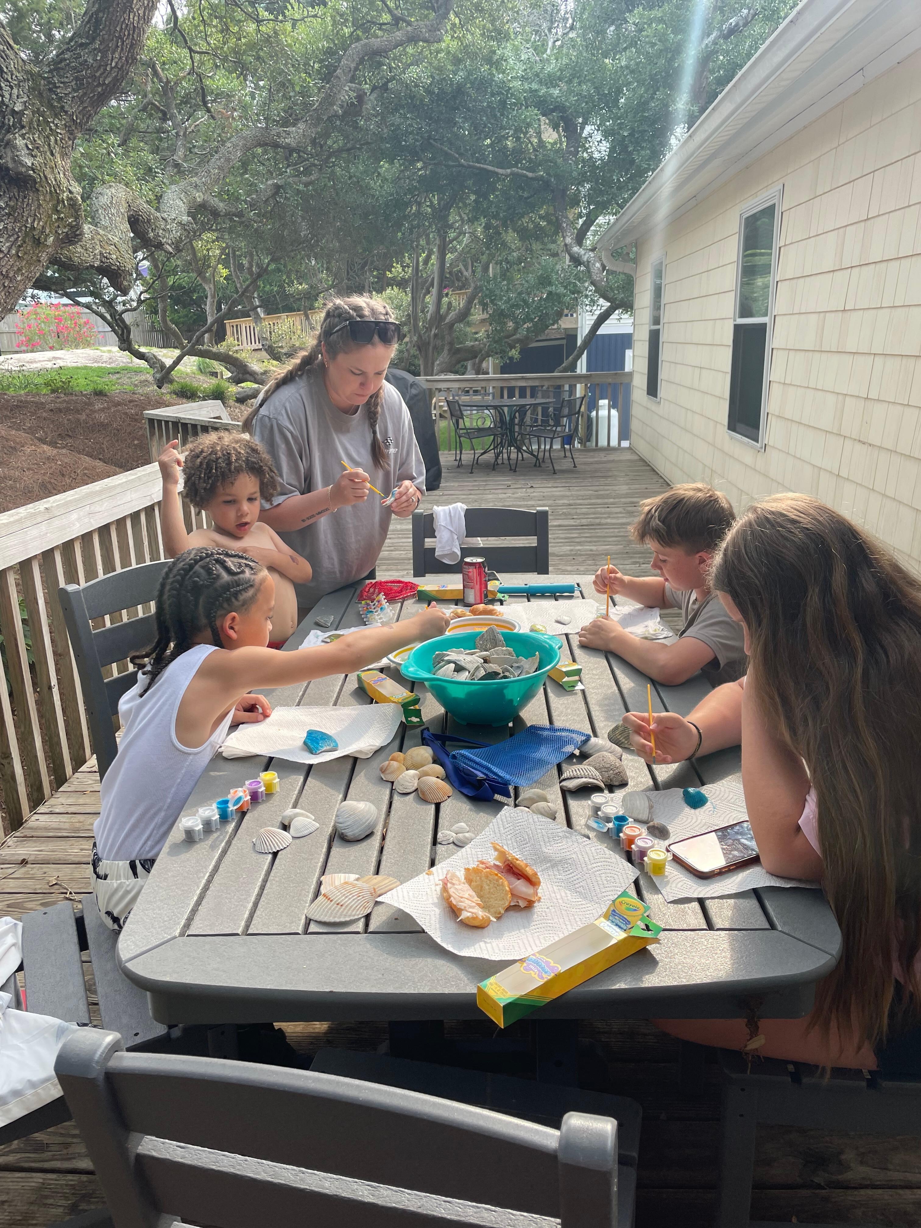 Kids painting shells!