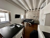 Front room with full kitchen