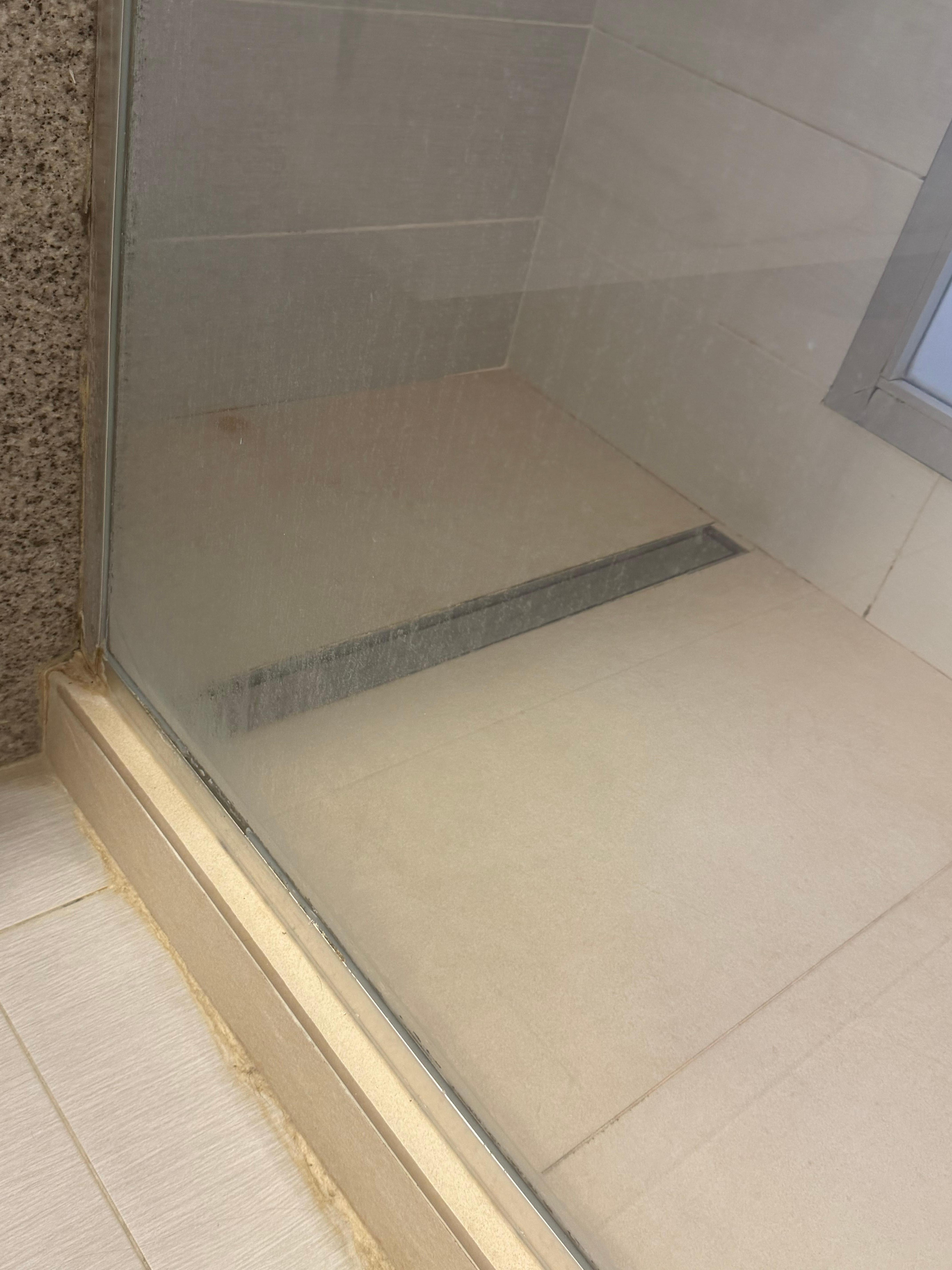 Grimes and filthy glass and tiles 