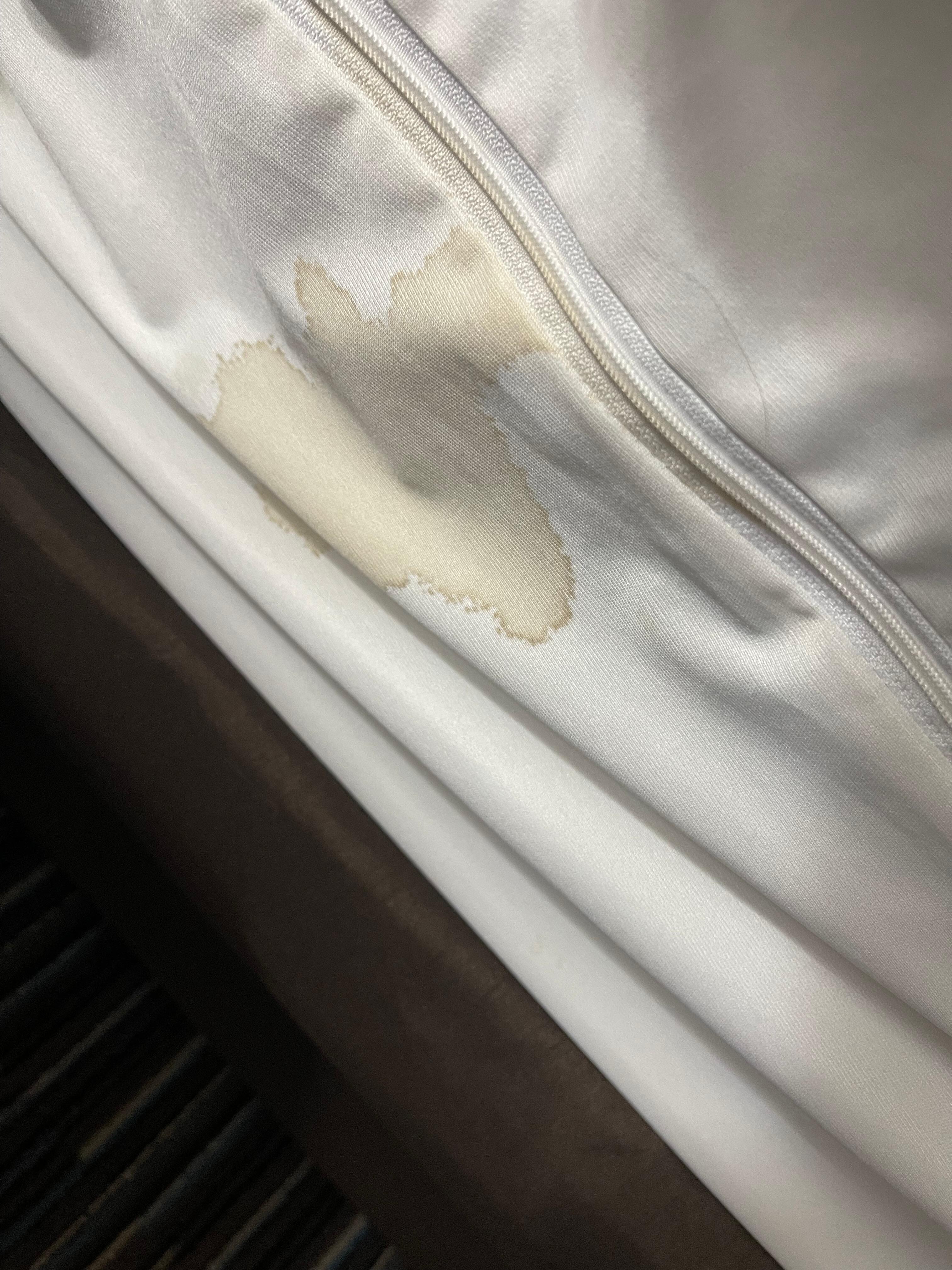 Mattress protector stained badly. Noticed cause the sheets kept coming off when laying in the bed.
