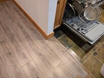 The wear and tear on the wood trim throughout the unit is very noticeable.