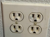 Dirt filled wall socket