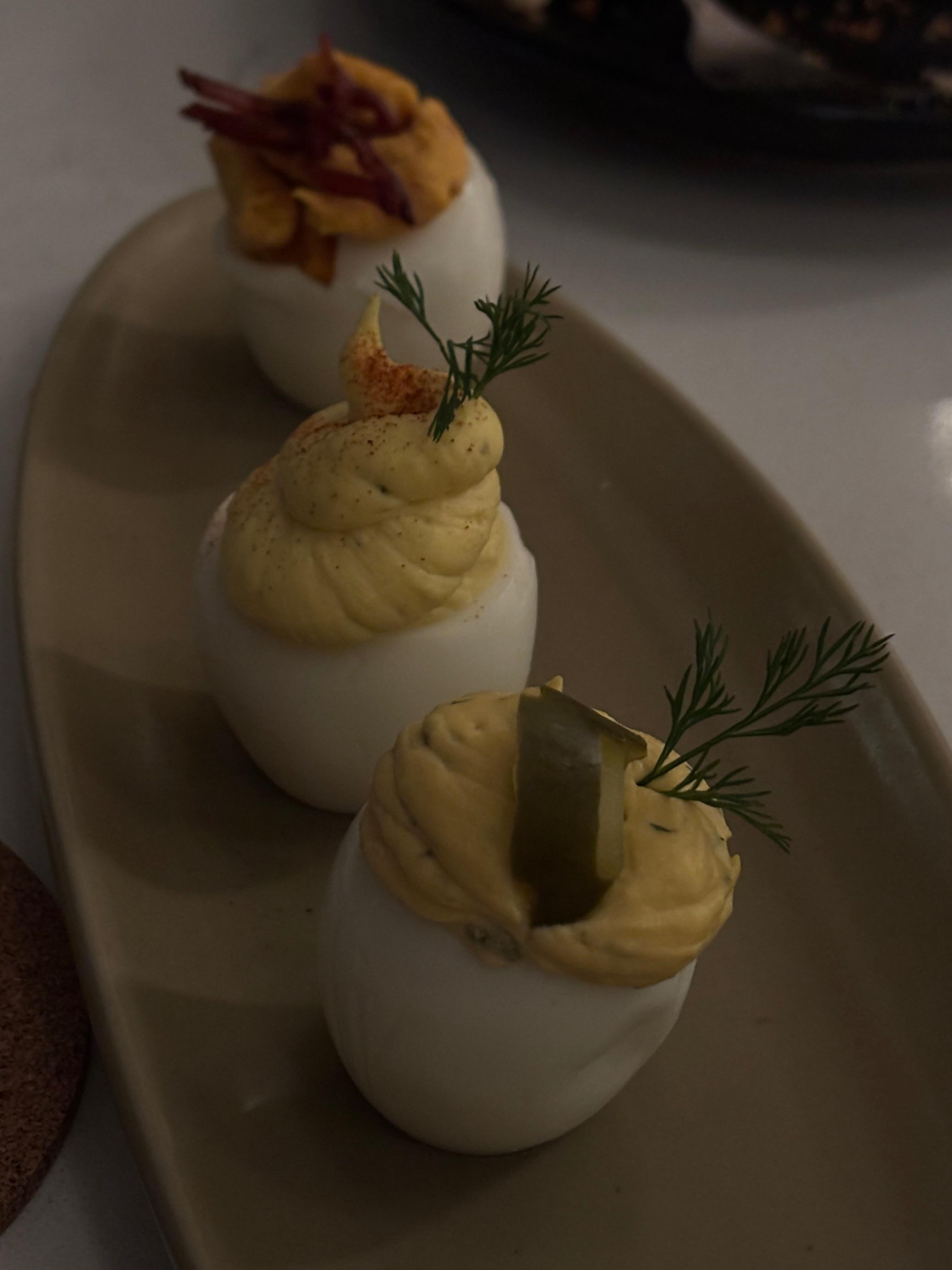 Top to bottom: maple bacon bourbon, classic, dill deviled egg flight. 