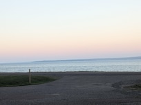 Lake Superior is right across the street, with plenty of lawn chairs to view from, and a bonfire pit too!