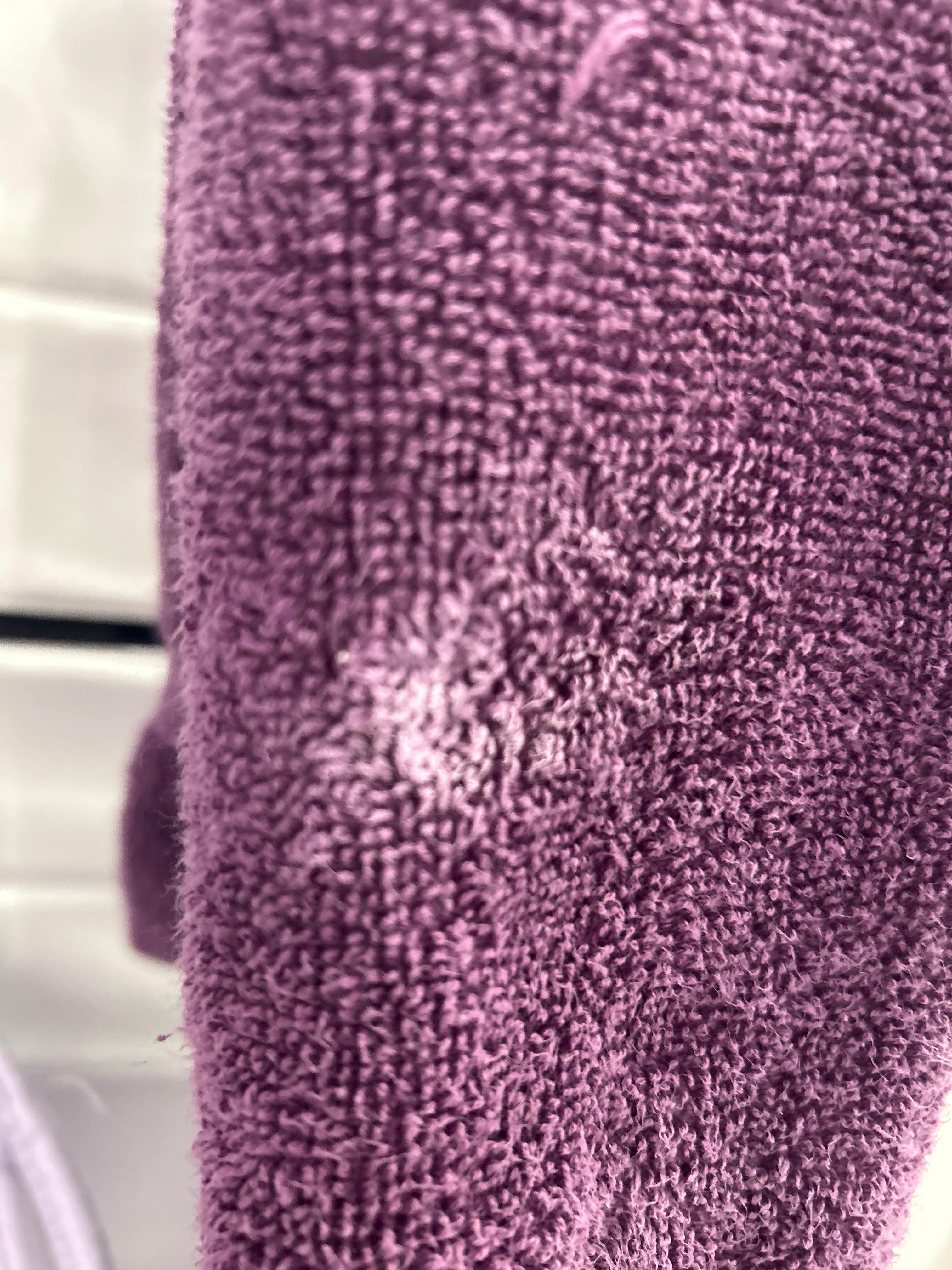 Dried toothpaste on bathroom hand towel upon checking in 