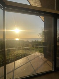 Primary bedroom evening view.