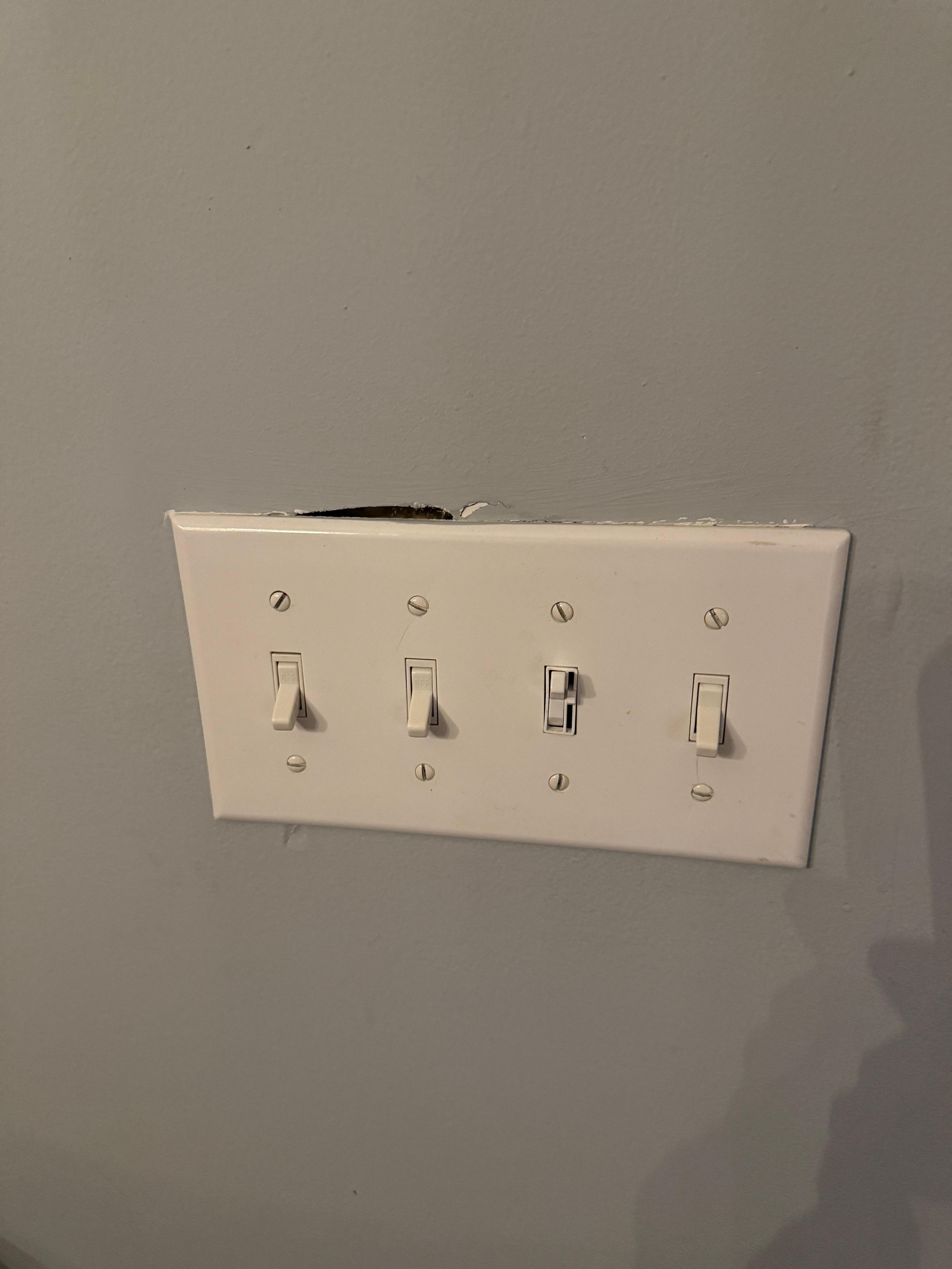 Holes above and around electrical switches
