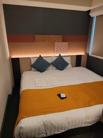 The space on this side of the bed was maybe 10 inches, the other side was less than 6.