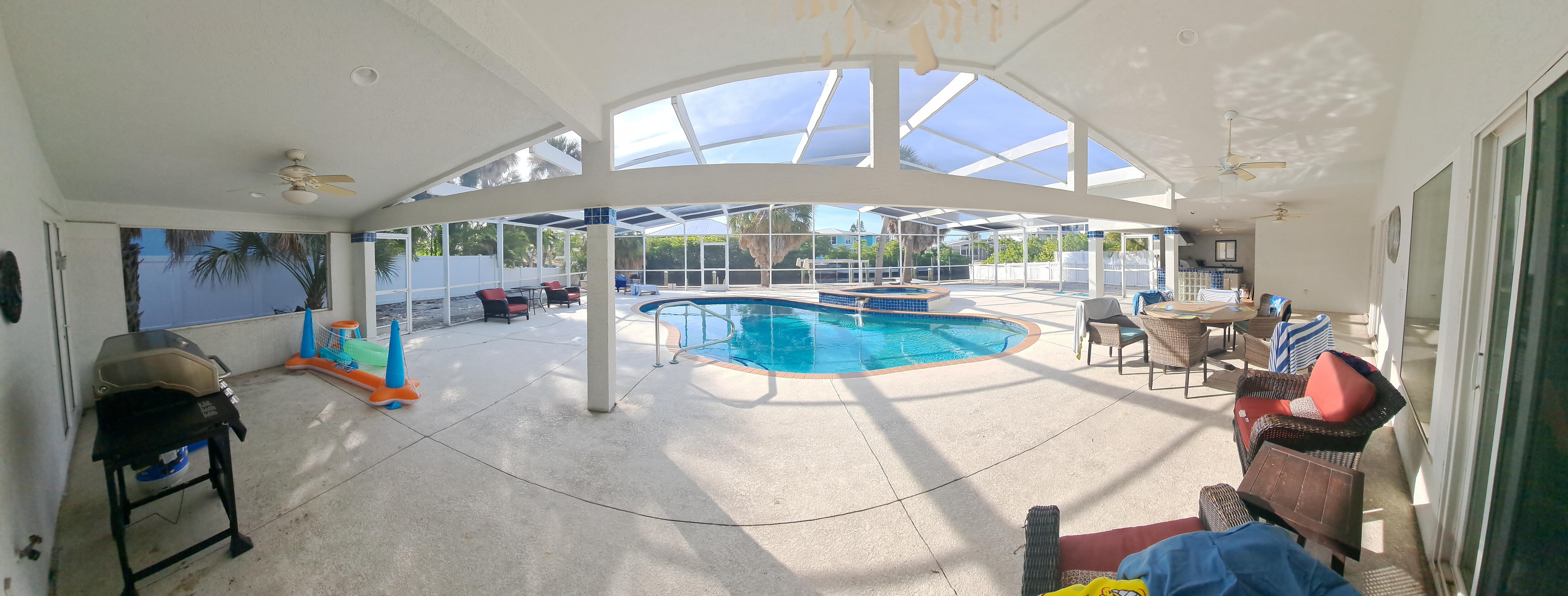 Lenai area with pool and spa. This is the area with the outdoor kitchen and houses the 3rd full bathroom. 