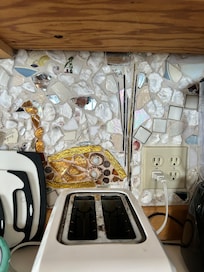 Mosaic backsplash in kitchen