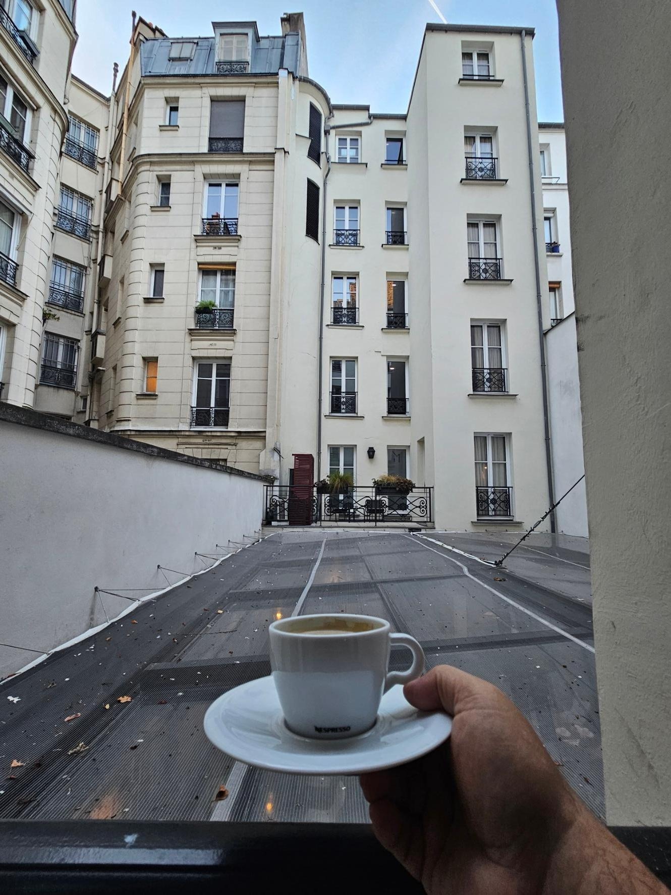 Coffee looking over the courtyard