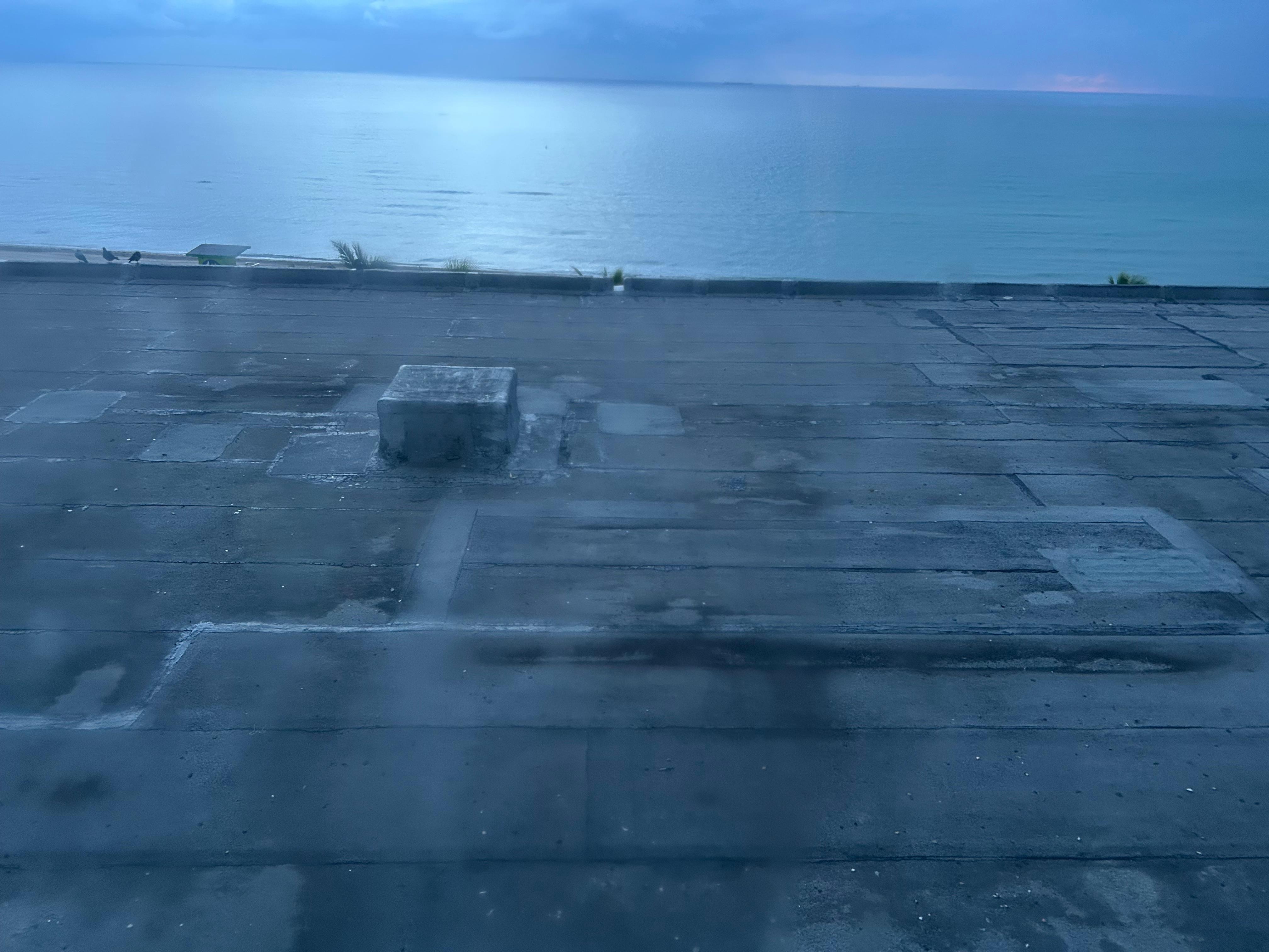 View from the windows, no beach view, old concrete roof