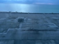 View from the windows, no beach view, old concrete roof