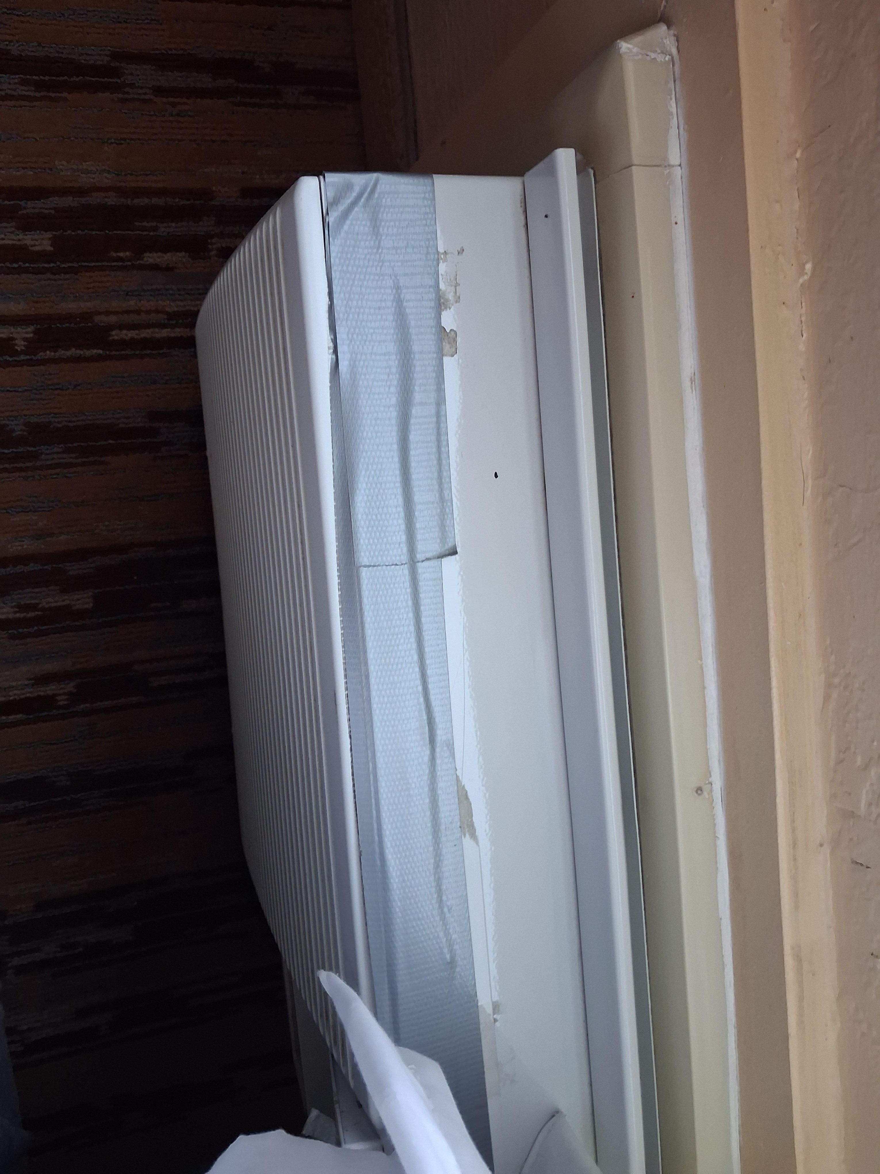 Duct tape holding the a/c together (bit not really holding it together)