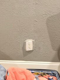 Outlets looked to be taped and painted over