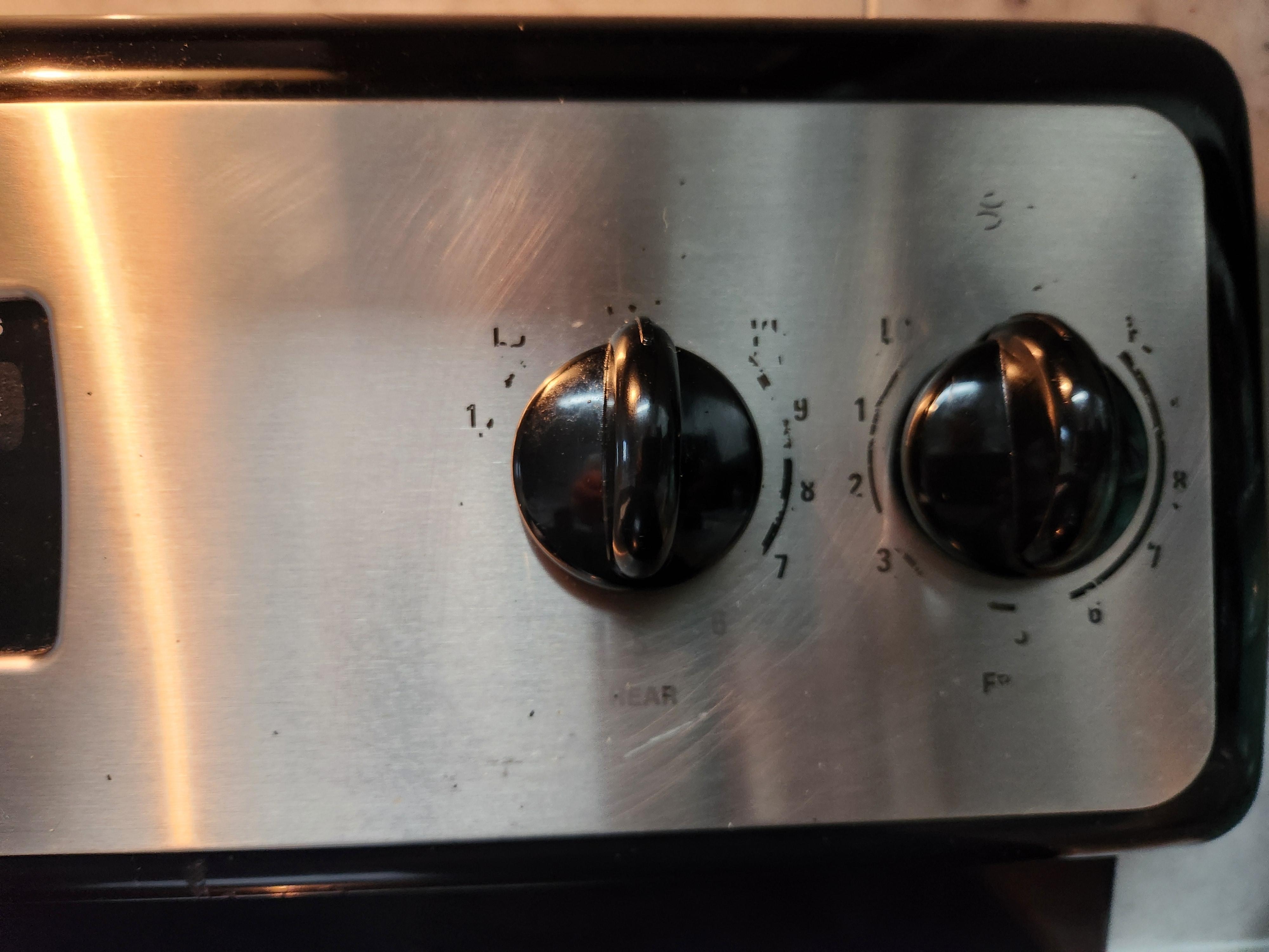 Knobs on the right side of the stove 