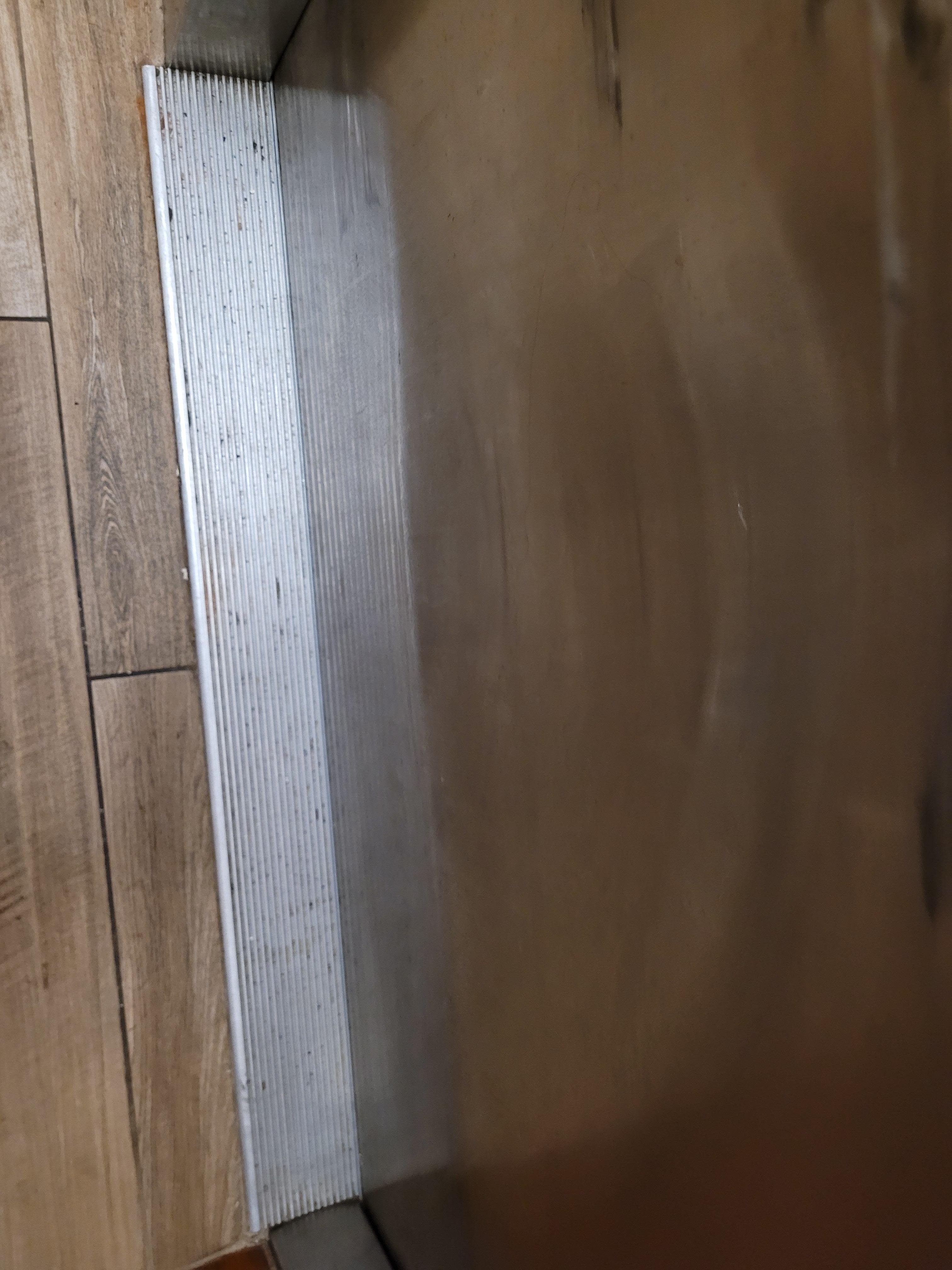 This is the floor plate in the elevator floor threshold, very dirty and we were there for days, never got cleaned.