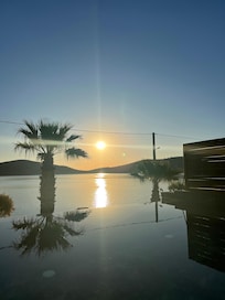 View from terrace in room with sea view and private pool
