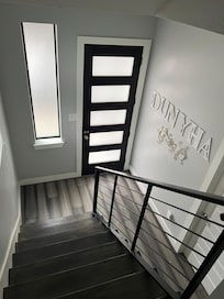Looking down to the front entrance of the rental.