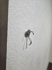 This was a hook in the master bath that was coming out of the wall when we arrived. This was the only thing that we saw damaged.
The host asked about the washing machine leaking. We washed 1 load and did find that it was leaking a small amount.