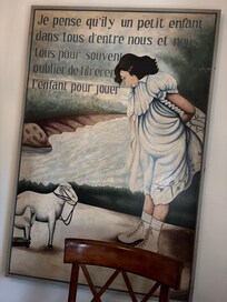 I had my brother-in-law translate the beautiful wall hanging. "I think there is a child in all of us, but we often forget to free the child to play."
