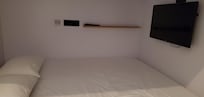 The beds are SO comfortable. The TV is arranged for viewing while you are resting.