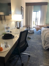 Two queen beds with uncomfortable pull-out couch