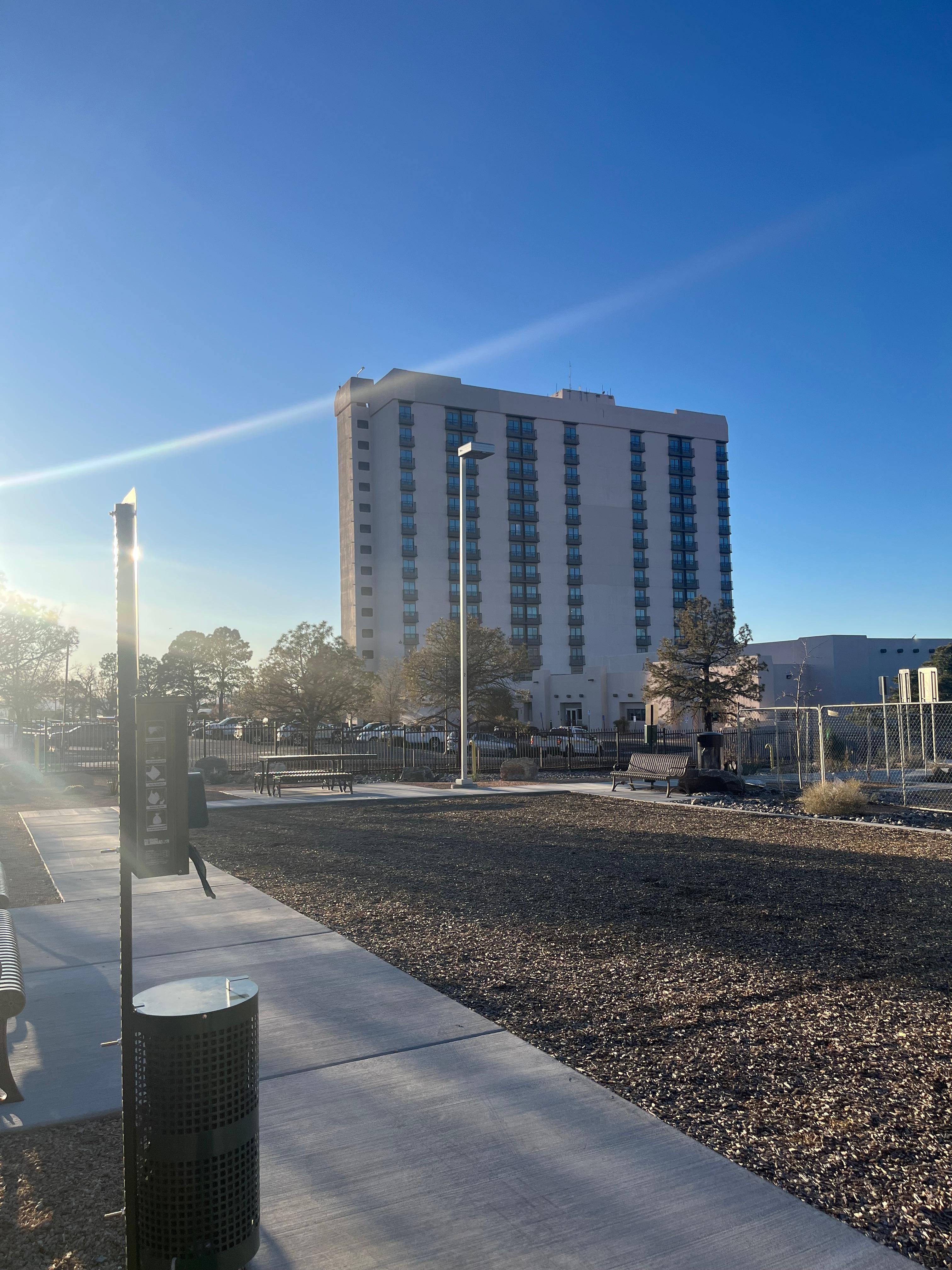 Photo of hotel from  cell phone waiting area. You can walk from this hotel to the airport. It’s a safe and fast walk.