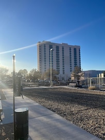 Photo of hotel from cell phone waiting area. You can walk from this hotel to the airport. It’s a safe and fast walk.