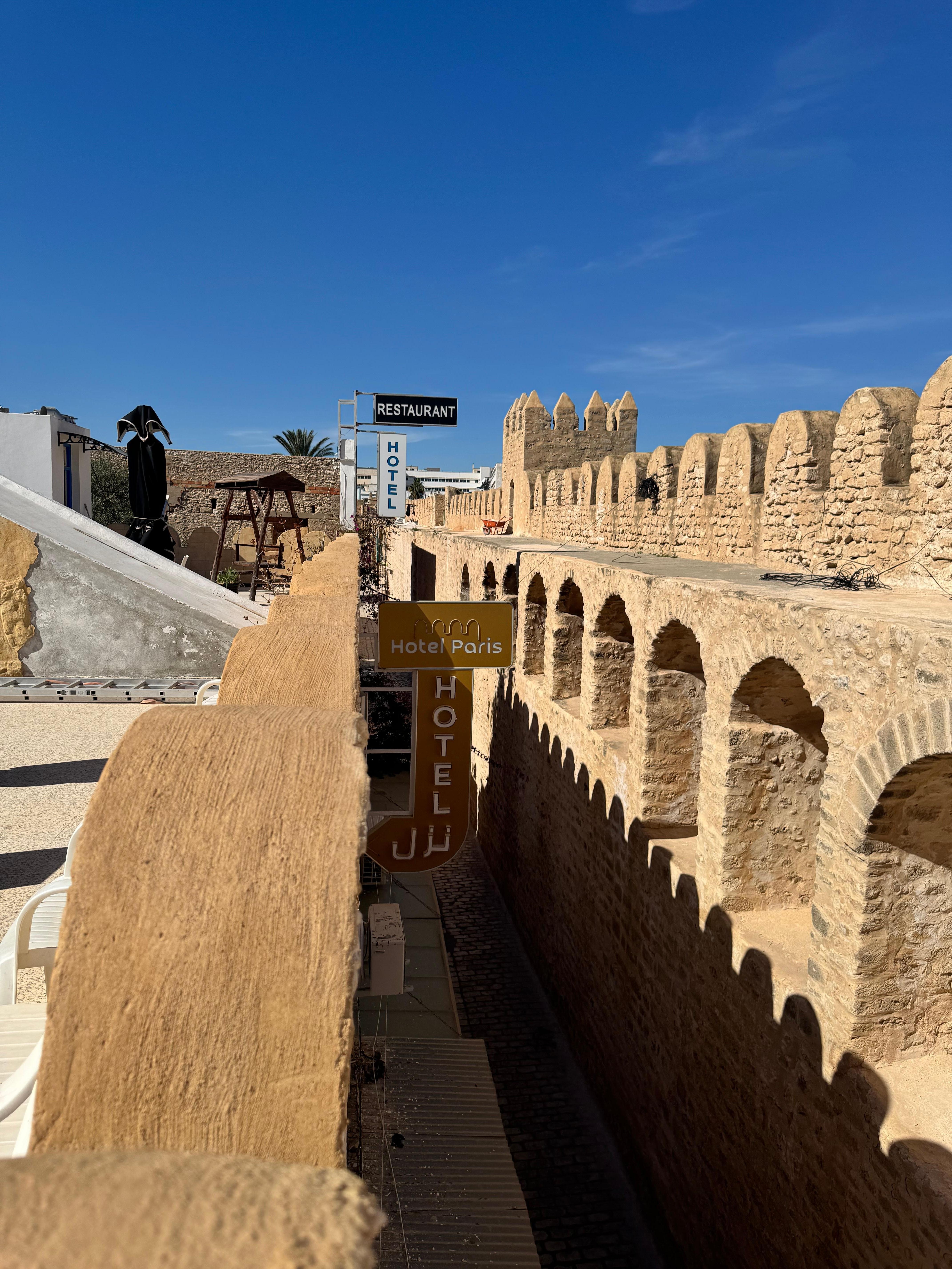 View from the rooftop showing the medina wall