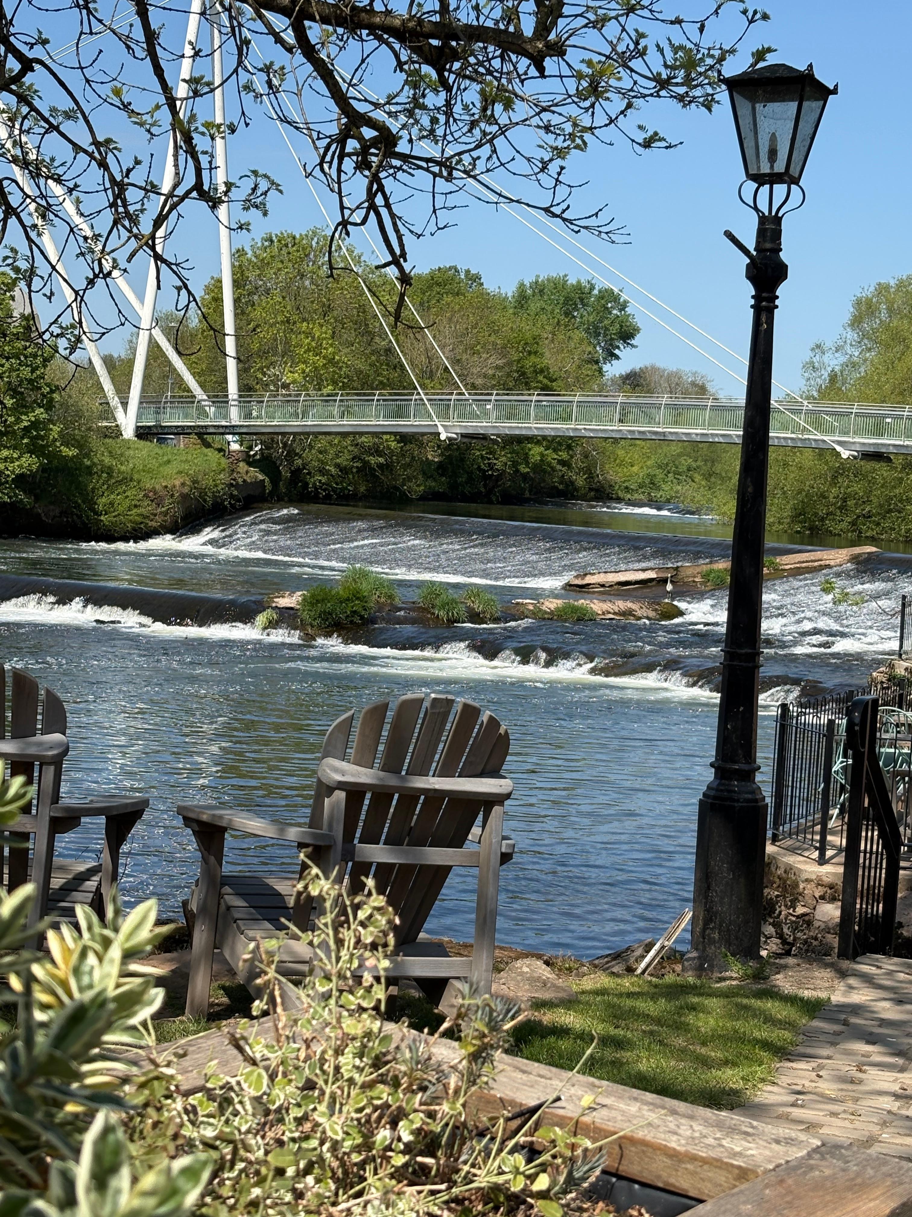 Sitting in chairs by the river