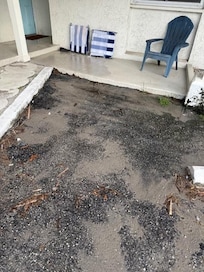 Dirt Everywhere. No water was provided to clean off sand Every time it rained iy brought more beach dirt to track through.