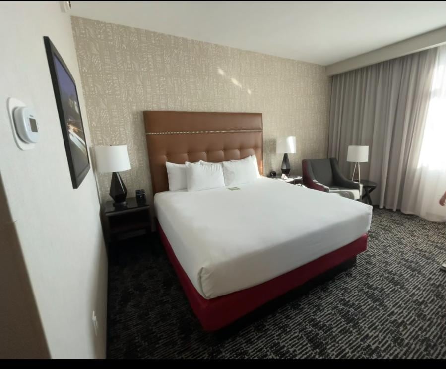 King size bed and sitting chair